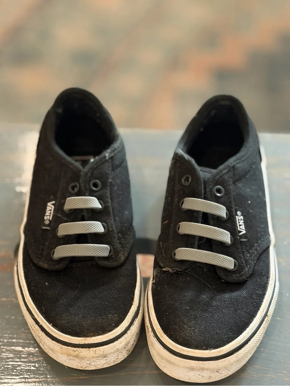 Vans Kids Black Canvas Slip-On Style Sneakers with Gray Elastic Laces